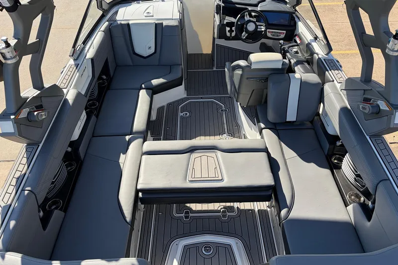 Slide: The Image of 2020 Nautique Super Air Nautique G23 interior with sleek seating and modern dashboard. - 37