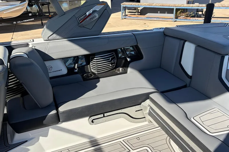 Slide: The Image of 2020 Nautique Super Air Nautique G23 interior with gray seating and modern design. - 40