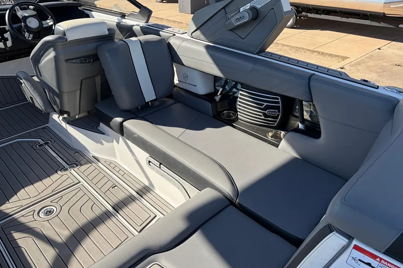Slide: The Image of 2020 Nautique Super Air Nautique G23 interior with gray seating and modern design. - 42