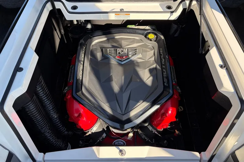 Slide: The Image of 2020 Nautique Super Air Nautique G23 engine compartment with PCM marine engine. - 57
