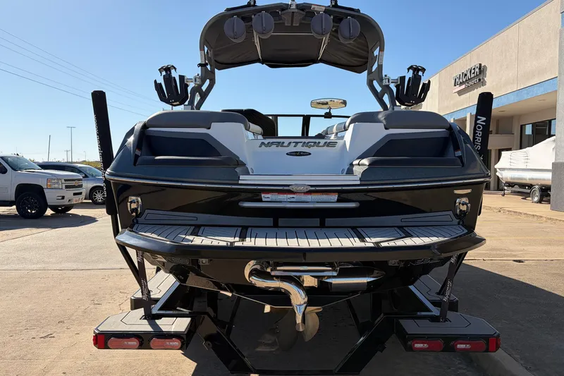 Slide: The Image of 2020 Nautique Super Air Nautique G23 boat rear view at dealership. - 6