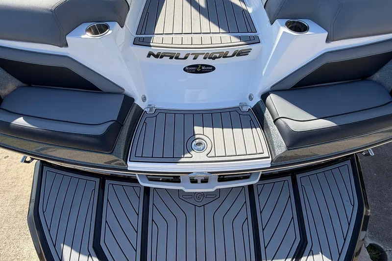 Slide: The Image of 2020 Nautique Super Air Nautique G23 boat interior with sleek seating and deck design. - 65