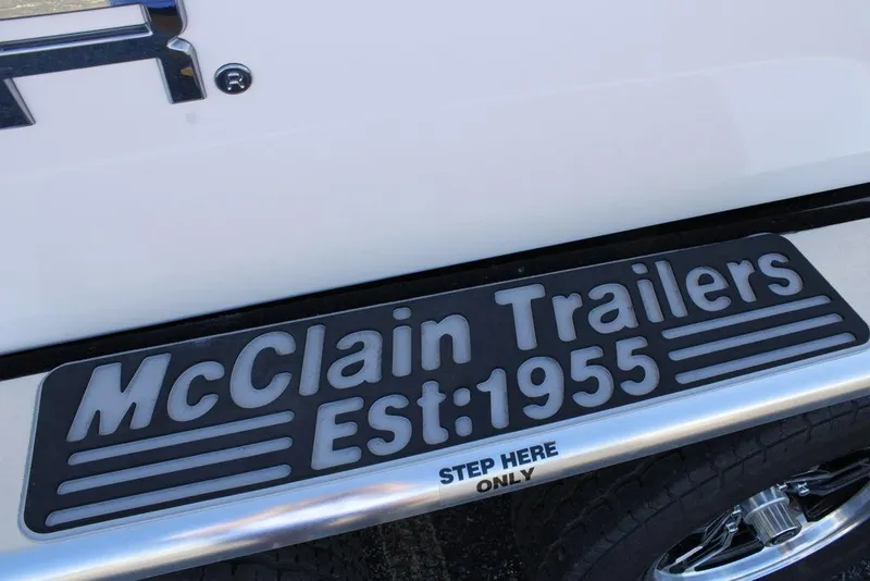 Slide: The Image of McClain Trailers step, established 1955, on 2026 Skeeter SX230 boat trailer. - 5