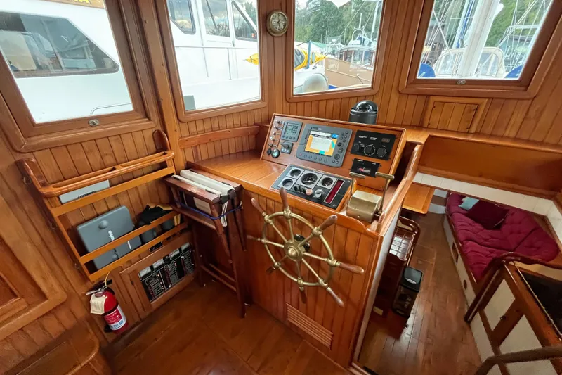 Slide: The Image of 1987 Liberty Gatsby yacht helm with wooden interior and navigation equipment. - 20