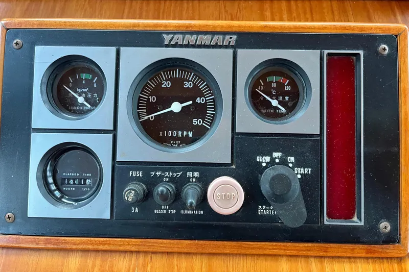 Slide: The Image of Control panel of a 1987 Liberty Gatsby with Yanmar engine gauges and controls. - 23