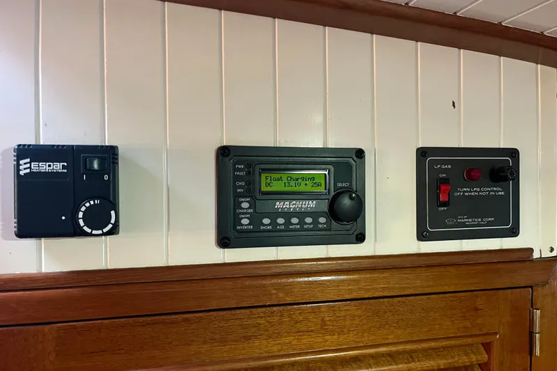 Slide: The Image of Control panels on a 1987 Liberty Gatsby boat interior wall. - 28