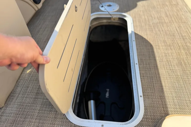 Slide: The Image of Open storage compartment on 2020 Bentley Pontoons 223 Cruise boat deck. - 14