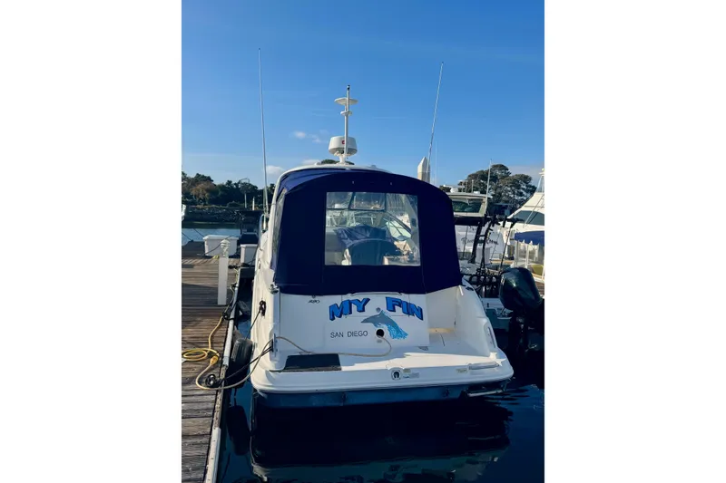 Slide: The Image of 2007 Sea Ray 290 Sundancer docked in San Diego marina, rear view. - 6