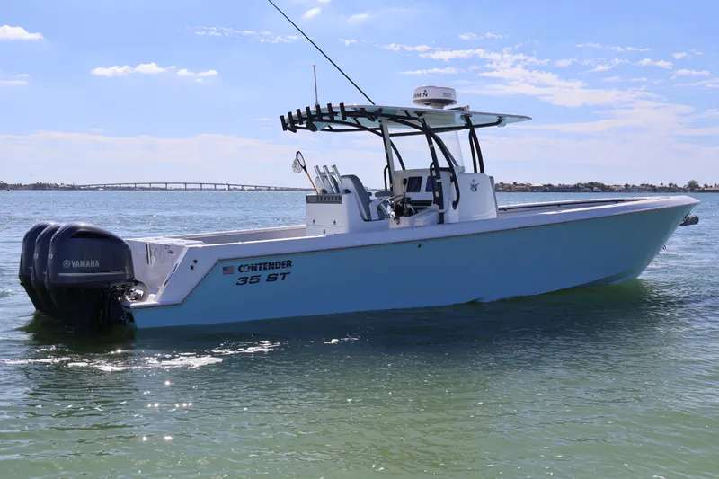 The Image of 2017 Contender 35 ST boat on calm water with Yamaha engines. - 0