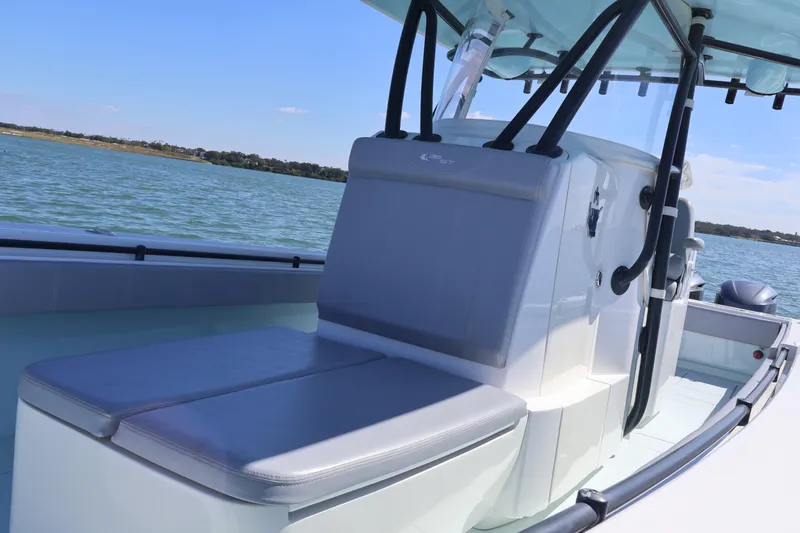 Slide: The Image of 2017 Contender 35 ST boat interior with seating, on calm water. - 5