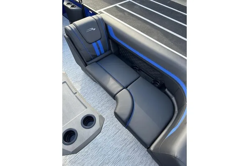 Slide: The Image of 2026 Bennington S Swingback 22 SSB boat seat with sleek black and blue design. - 16
