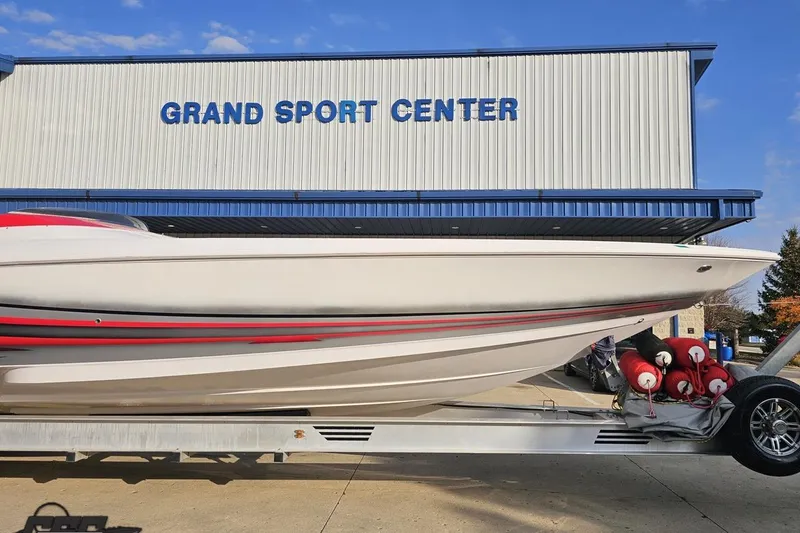 Slide: The Image of 2008 Donzi 38 ZR boat on trailer at Grand Sport Center. - 12
