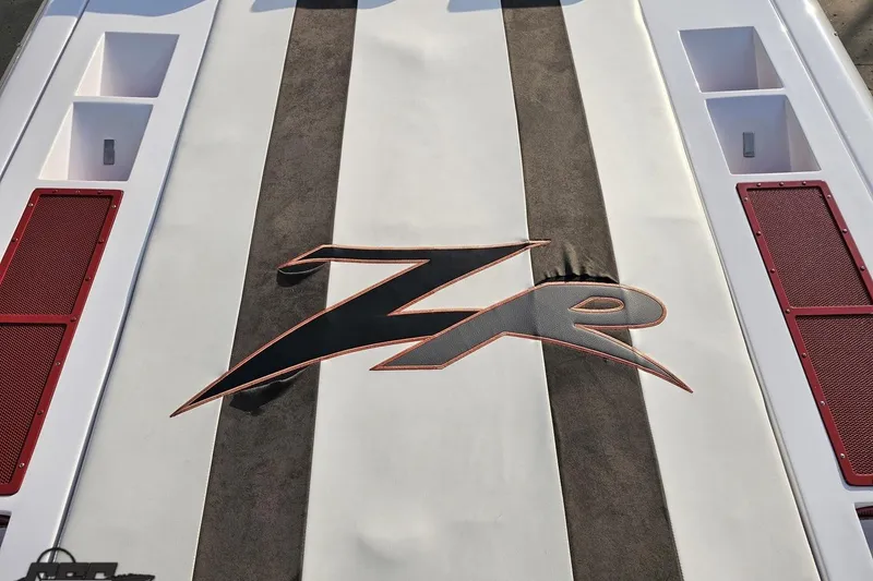Slide: The Image of 2008 Donzi 38 ZR boat deck with bold logo and red accents. - 33