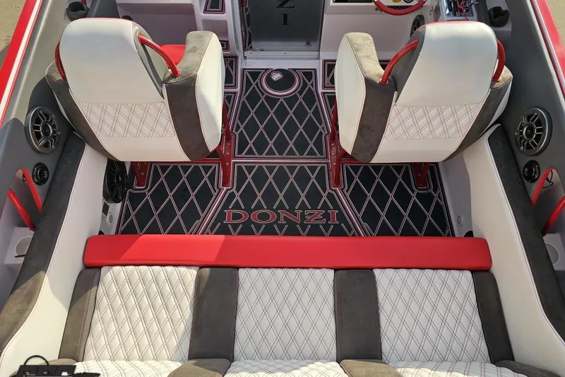 Slide: The Image of Interior of a 2008 Donzi 38 ZR boat with stylish seating and custom flooring. - 39