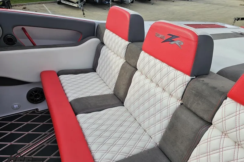 Slide: The Image of 2008 Donzi 38 ZR boat interior with red and white quilted seats. - 40