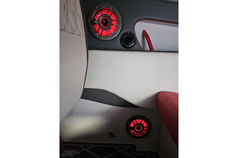 Slide: The Image of Interior of 2008 Donzi 38 ZR boat with illuminated red speakers. - 43