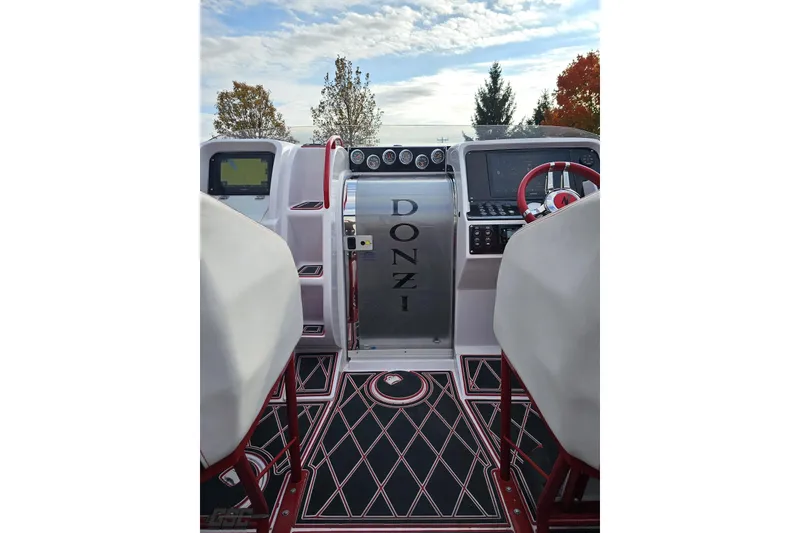 Slide: The Image of 2008 Donzi 38 ZR boat cockpit with modern controls and stylish seating. - 46