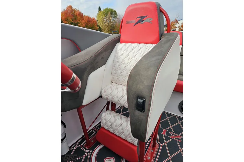 Slide: The Image of 2008 Donzi 38 ZR boat seat with red and white upholstery, diamond stitching. - 86