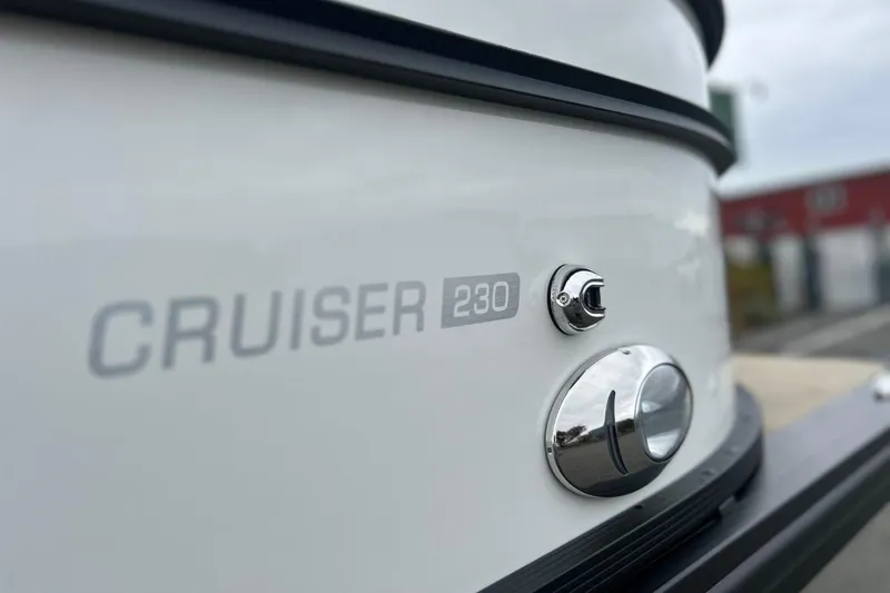 Slide: The Image of 2026 Harris CRUISER 230 SL boat detail, showcasing sleek design and branding. - 12