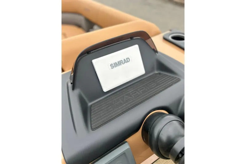 Slide: The Image of 2026 Harris CRUISER 230 SL dashboard featuring Simrad display and controls. - 22