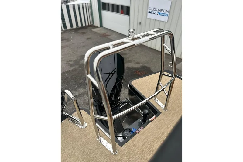 Slide: The Image of 2026 Harris CRUISER 230 SL boat with stainless steel railing and control panel. - 32