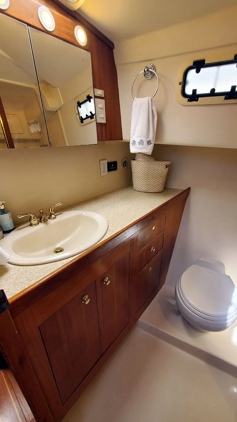 Slide: The Image of Guest Head Vanity and Toilet - 23