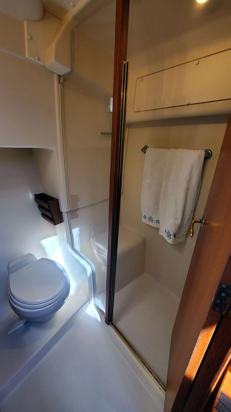 Slide: The Image of Guest Head Toilet and Shower - 24