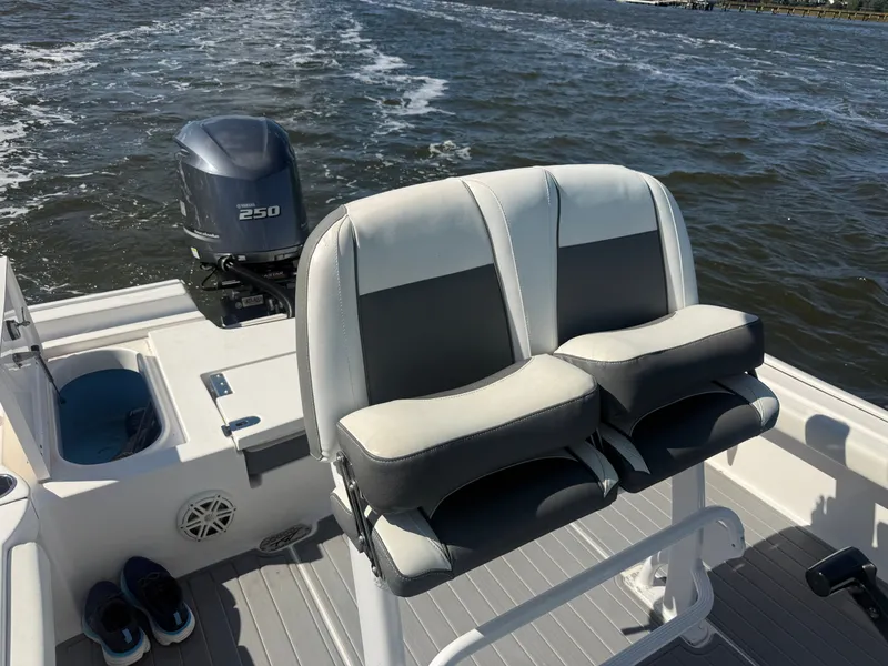 Slide: The Image of 2020 Tidewater 2300 Carolina Bay boat with dual seats and Yamaha 250 engine on water. - 37