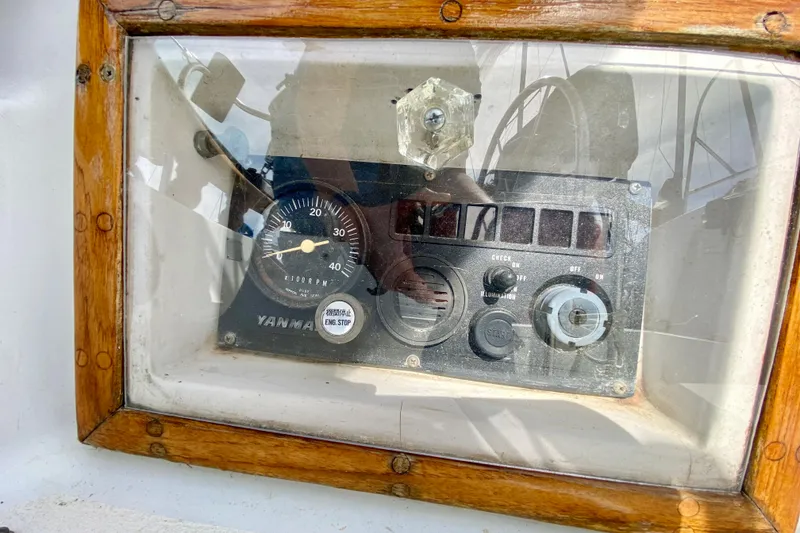 Slide: The Image of Control panel of a 1986 Bayfield 32 sailboat with Yanmar engine gauges. - 10