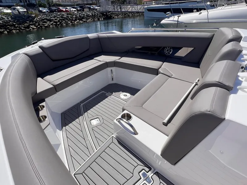 Slide: The Image of 2019 Cruisers Yachts 338 IO with spacious seating and sleek design. - 19