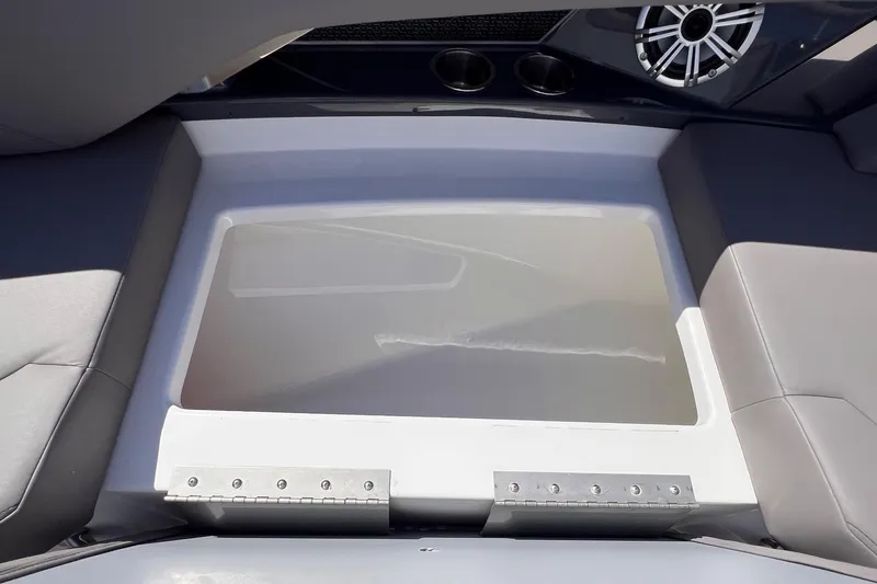 Slide: The Image of 2019 Cruisers Yachts 338 IO interior seating area with speaker and cup holders. - 25