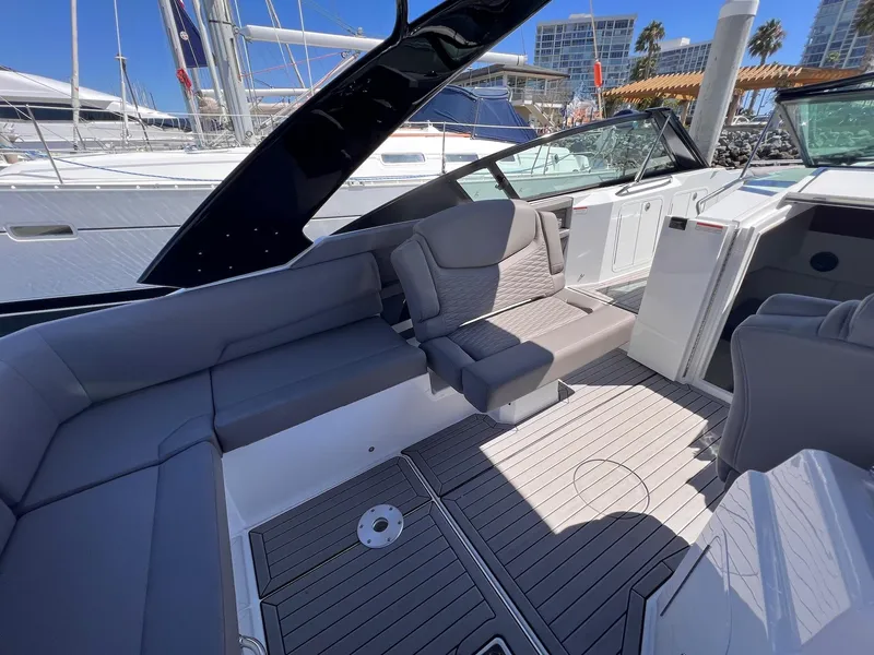 Slide: The Image of 2019 Cruisers Yachts 338 IO interior with gray seating and modern design. - 7