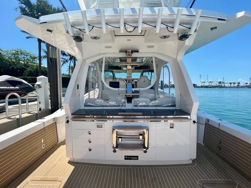 Slide: The Image of 2021 Scout 530 LXF luxury yacht with spacious deck and modern amenities. - 14