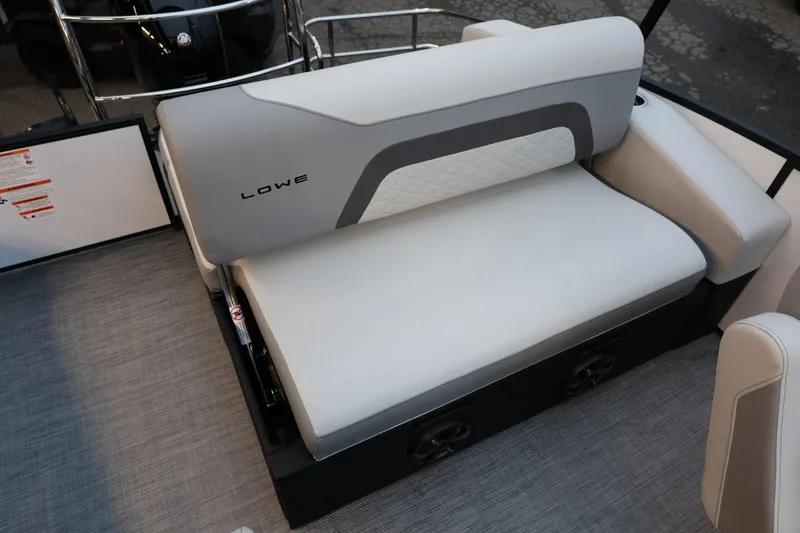 Slide: The Image of 2026 Lowe SS 230 CL boat seat with gray and white upholstery. - 29