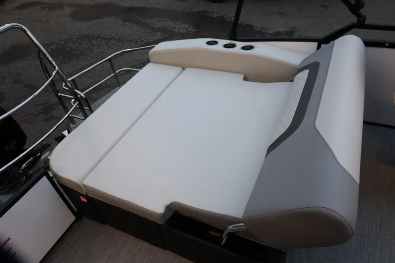 Slide: The Image of 2026 Lowe SS 230 CL boat with luxurious white and gray seating. - 30