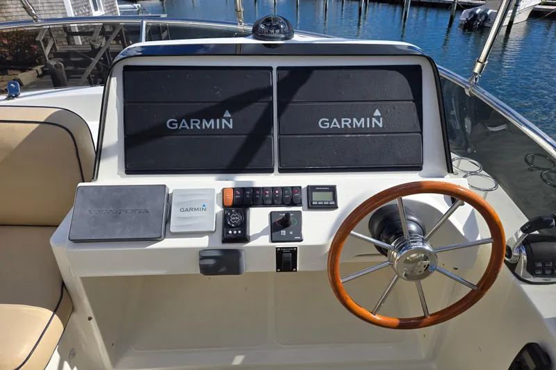 Slide: The Image of 2017 Sabre 48 Fly Bridge anchor chain and rope detail on deck. - 13