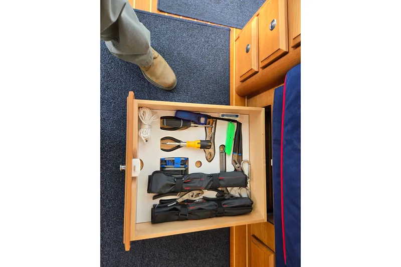 Slide: The Image of Luxurious interior of 2017 Sabre 48 Fly Bridge with blue cushioned seating. - 31