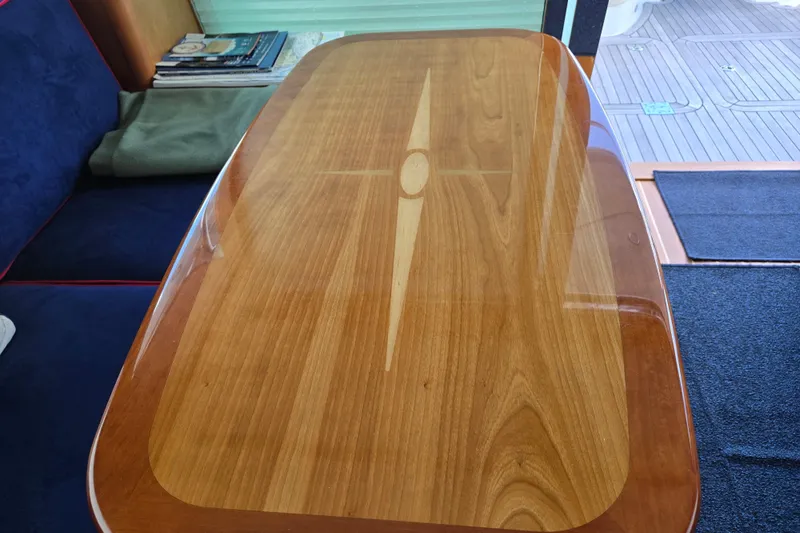 Slide: The Image of Luxurious interior of 2017 Sabre 48 Fly Bridge with blue cushioned seating. - 32