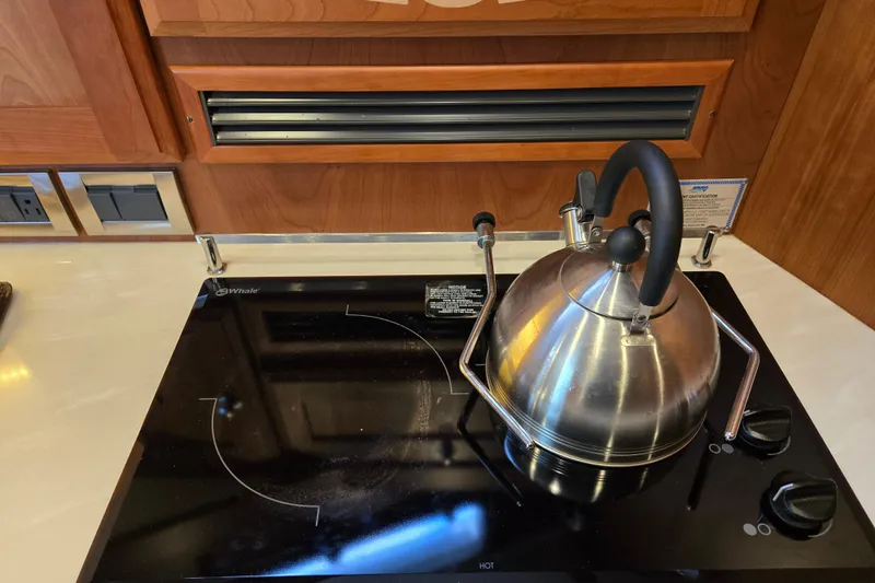 Slide: The Image of Stainless steel sink on 2017 Sabre 48 Fly Bridge yacht kitchen counter. - 54