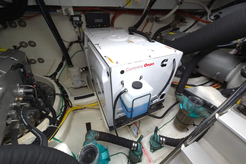 Slide: The Image of Storage area on a 2017 Sabre 48 Fly Bridge with cleaning supplies and equipment. - 73