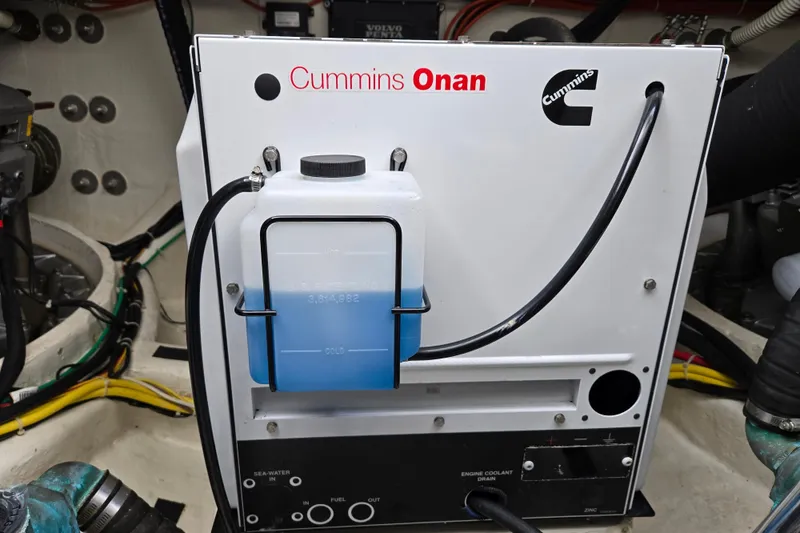 Slide: The Image of Engine compartment of 2017 Sabre 48 Fly Bridge yacht, featuring D8-IPS700 engine. - 74