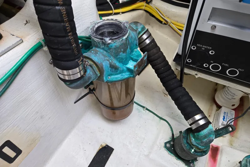 Slide: The Image of Engine room of 2017 Sabre 48 Fly Bridge with Cummins Onan generator. - 76