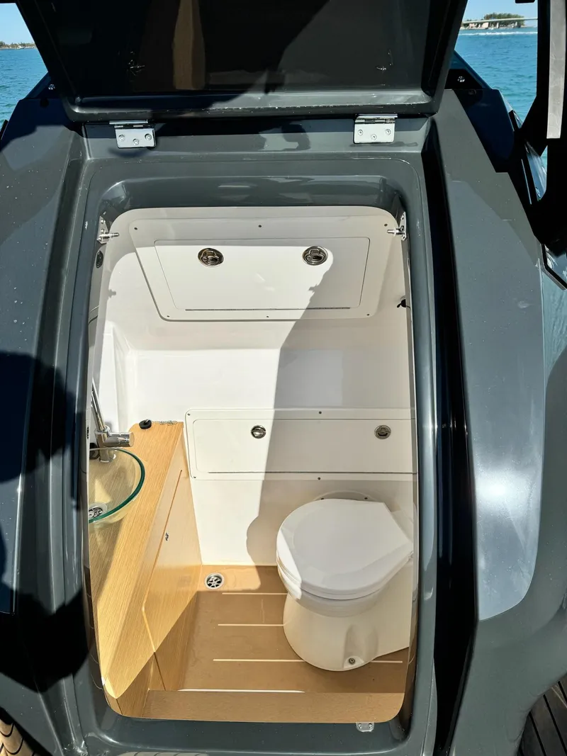 Slide: The Image of 2025 Skipper-BSK 34 boat interior with compact bathroom and modern fixtures. - 11