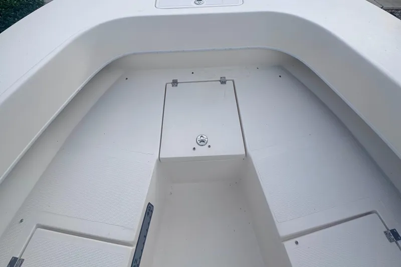 Slide: The Image of 2015 Dusky 278 boat with spacious deck and storage compartments. - 19