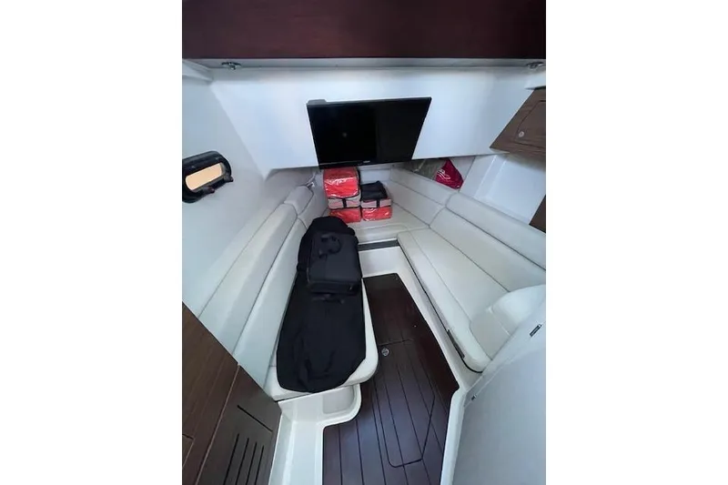 Slide: The Image of Interior of 2020 Boston Whaler 350 Realm with seating and storage. - 13