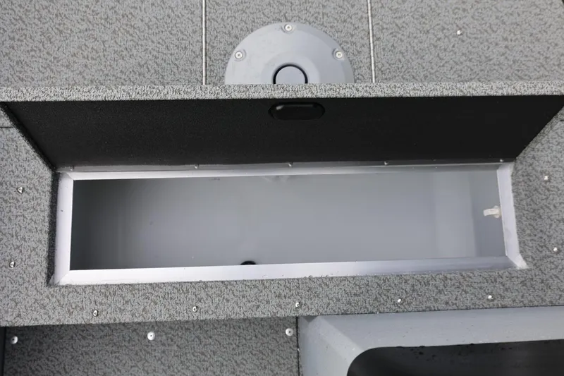 Slide: The Image of Storage compartment in 2026 Lund 1600 Fury SS boat, featuring a sleek, durable design. - 28