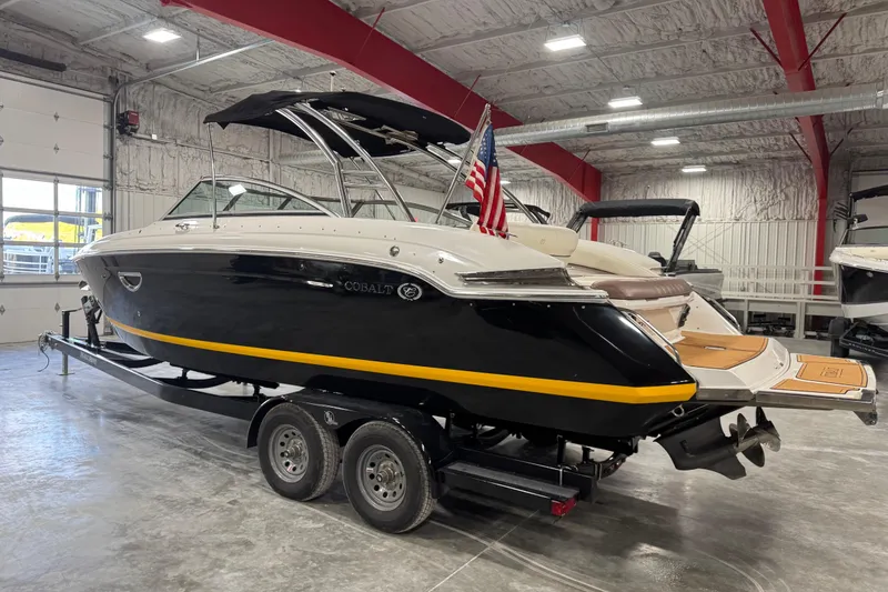 Slide: The Image of 2012 Cobalt 276 boat on trailer in indoor storage facility. - 4