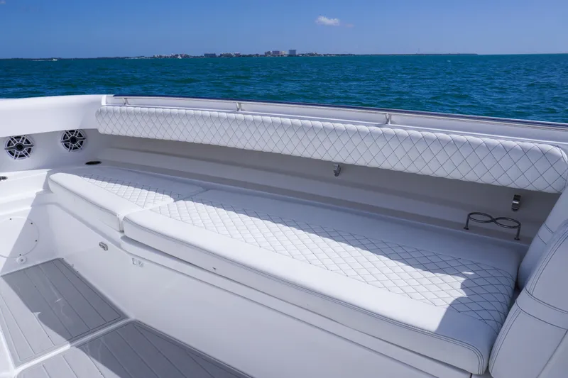 Slide: The Image of Luxurious seating on 2023 HCB 53 Sueños boat with ocean view. - 23