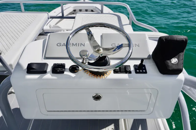 Slide: The Image of Helm of 2023 HCB 53 Sueños boat with Garmin navigation system. - 40