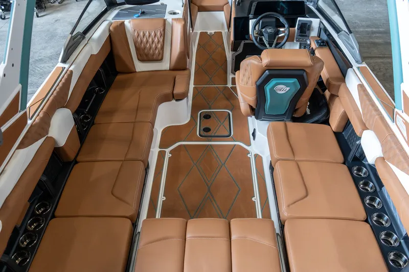 Slide: The Image of Interior of 2026 Malibu M230 featuring luxurious leather seating. - 3